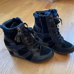 Faux leather high heeled low boots.